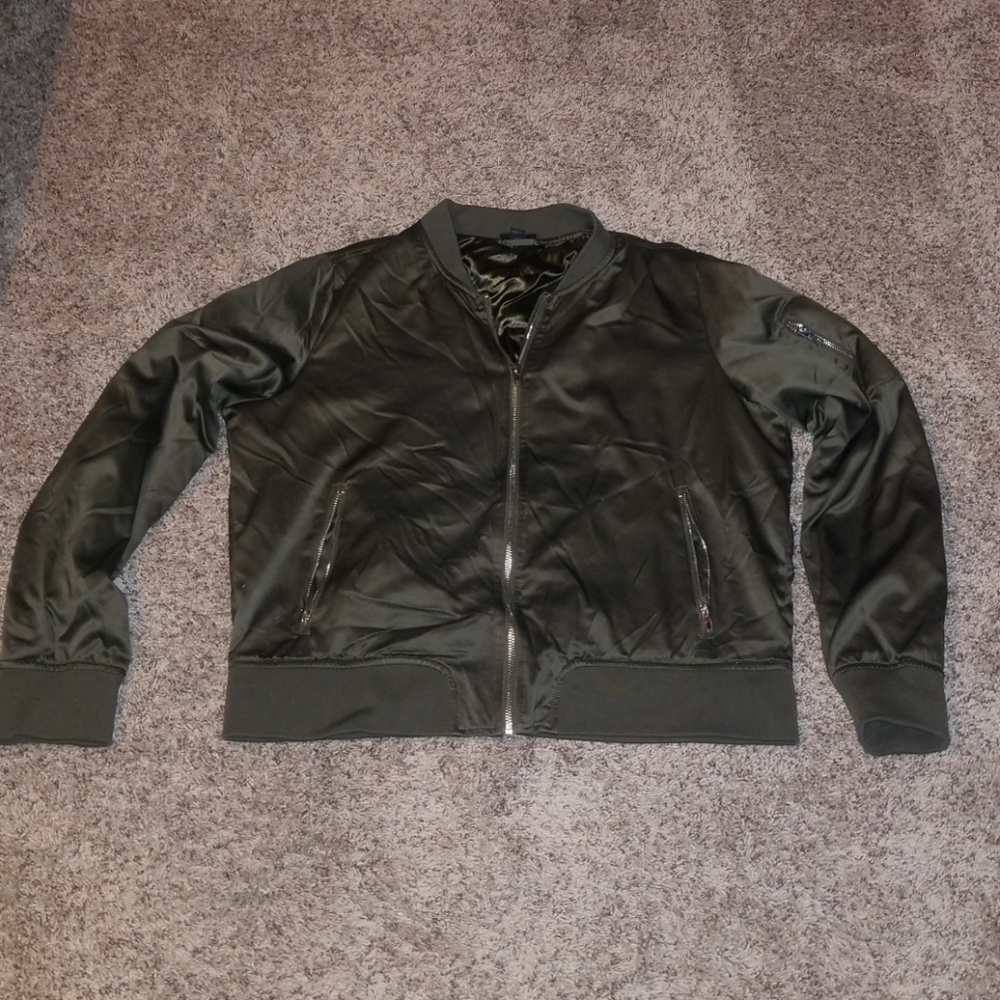Green silky jacket with zipper on arm